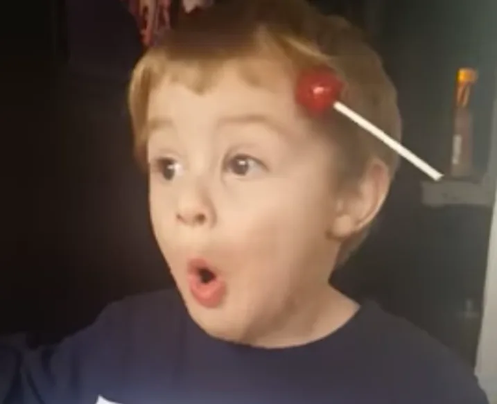 Kid Realizes Lollipop Is Stuck To Head, Has Epic Reaction