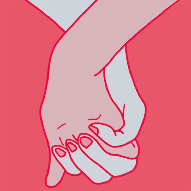 Hand-holding doesn't get much more intimate than interlaced fingers. 