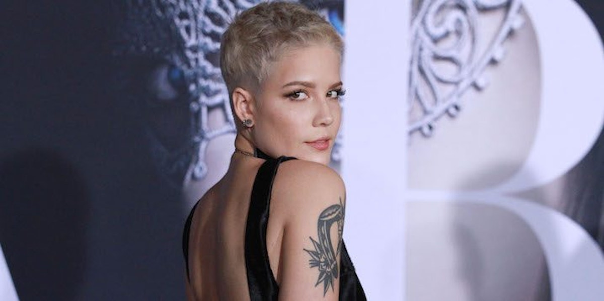 Halsey flaunts underboob in a tiny sequinned crop top at the MTV
