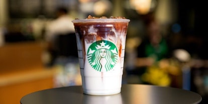 https://imgix.bustle.com/elite-daily/2017/05/17075153/starbucks-iced-latte-with-ice-cubes.jpg?w=414&h=207&fit=crop&crop=faces&auto=format%2Ccompress