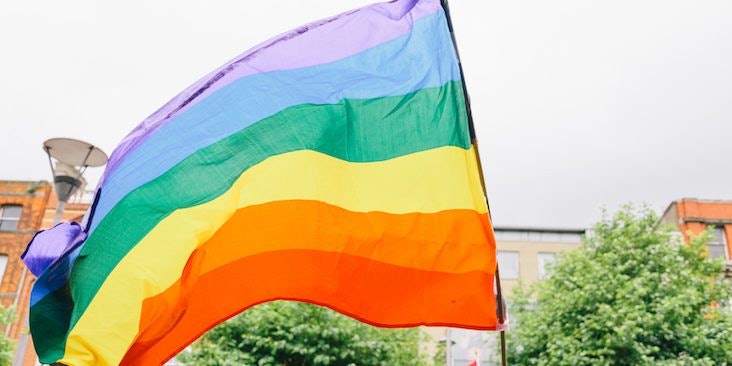 interlocking gay pride symbol a rainbow