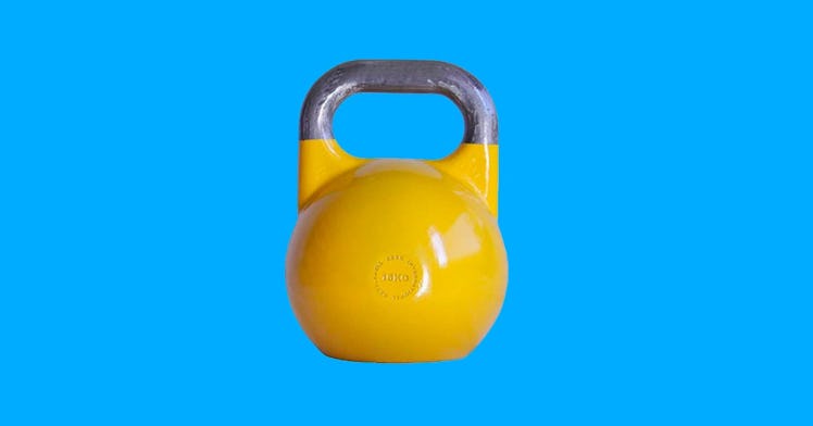 A yellow Ader Pro-Grade International Kettlebell for home workouts