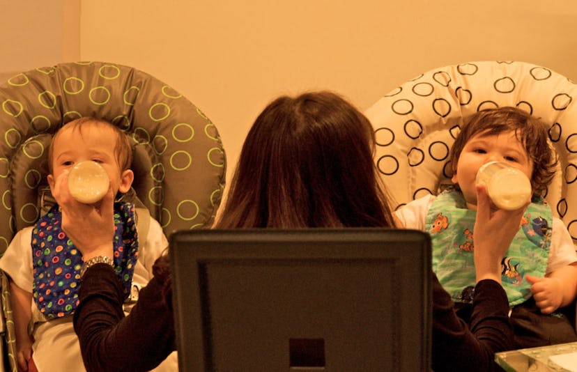 mom feeding twins