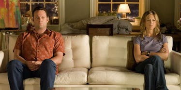 A scene from a film "The Break-Up" with two parents sitting on a couch