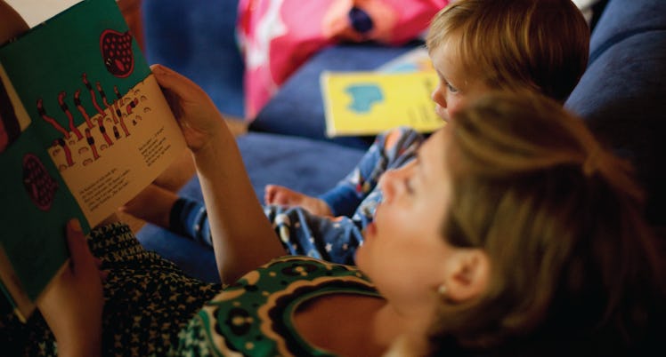 A mom reading to her toddler