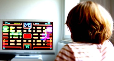 A 5-year-old playing video games