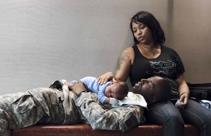 Soldier Relaxes With His Baby