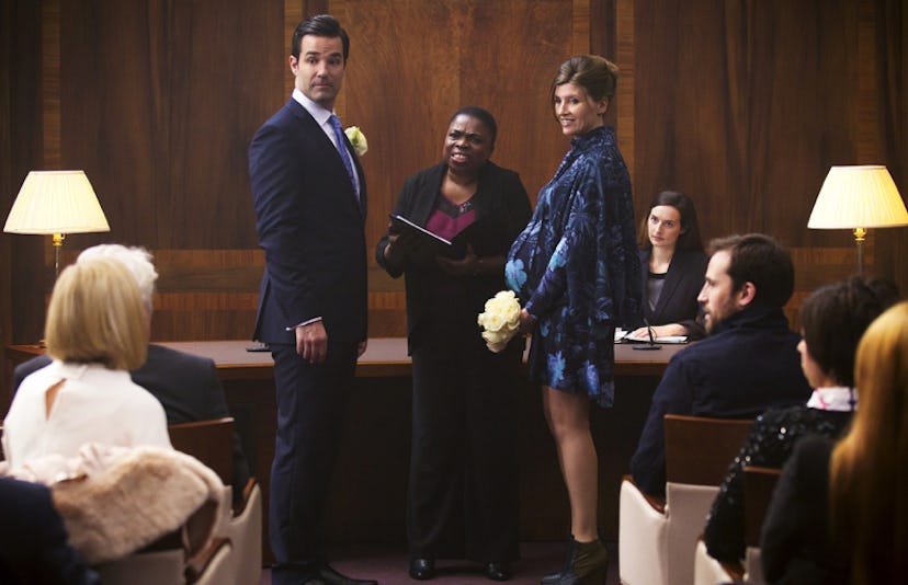 A marriage scene in a city hall from "Catastrophe"