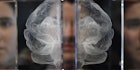 A man standing blurred behind a 3D-printed brain separated into two pieces