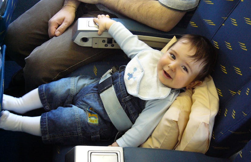 airplane baby smiling