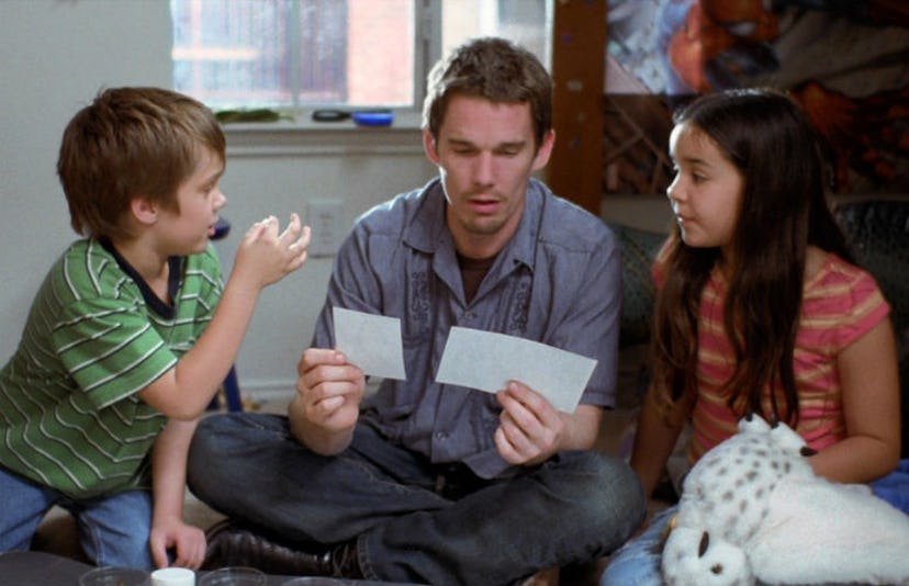 A scene from "Boyhood" with the main characters sitting in a circle