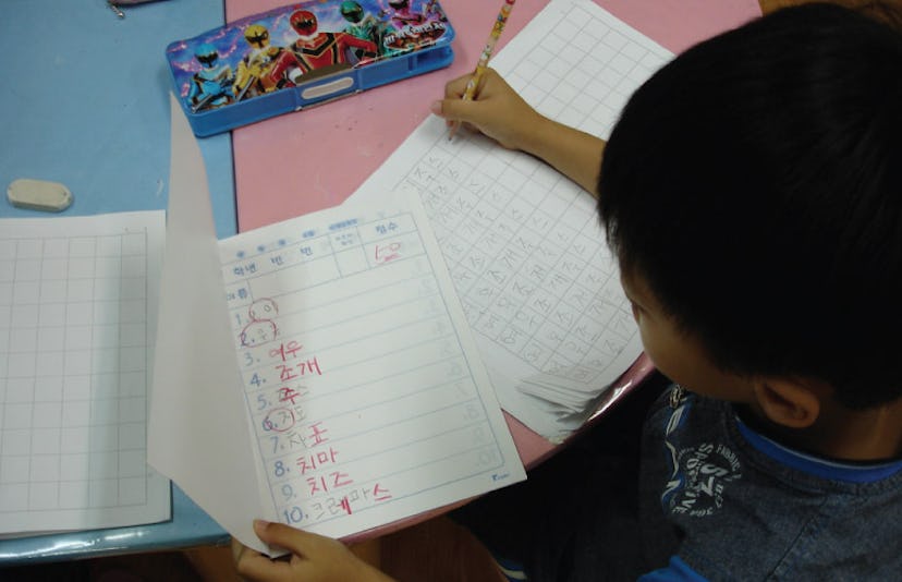 A young boy doing a test