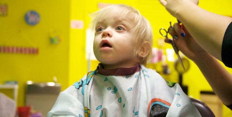 baby getting his first haircut