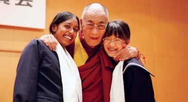dalai lama and schoolgirls