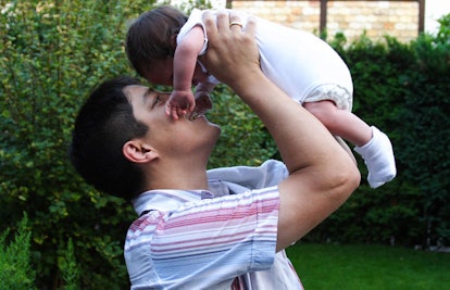 father-lifting-baby