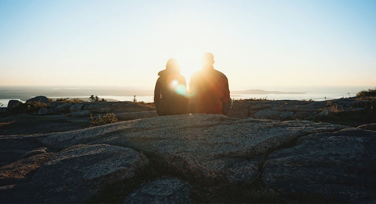 couple staring at a landscape