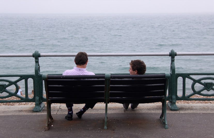 father and son on bench