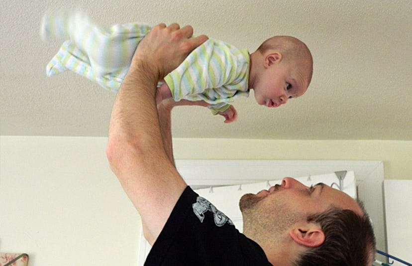 father-lifting-baby-in-the-air