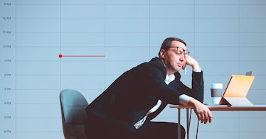 a man falls asleep at his desk at work after a night of no sleep