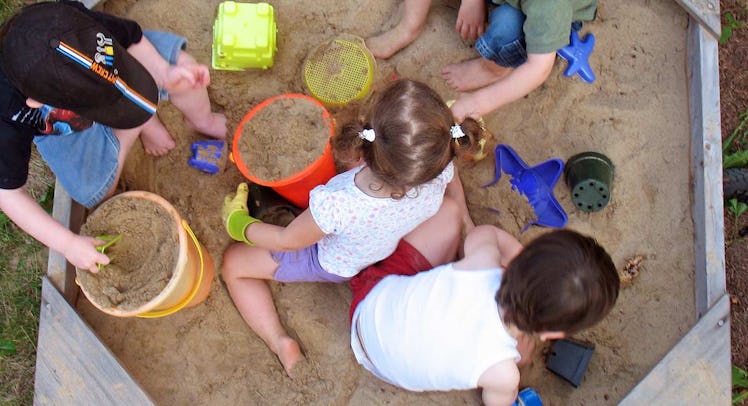 kids playing in sandbox