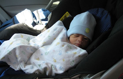 newborn baby in car