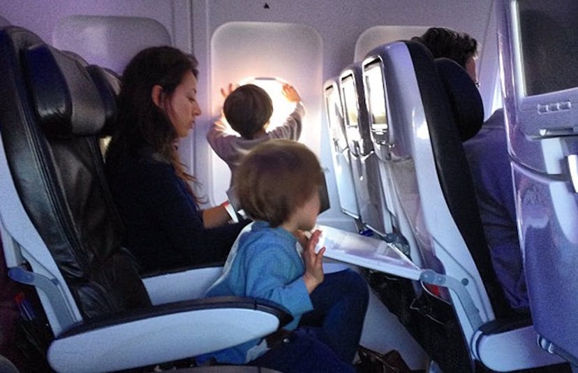 toddlers in airplane