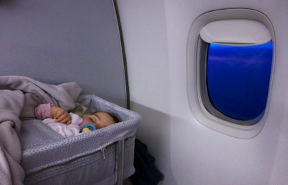 baby sleeping on airplane