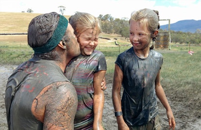 family in mud race