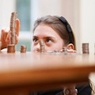 girl counting coins