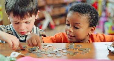 kids counting coins on store counter