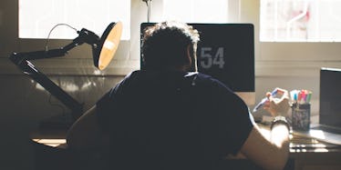 man working on computer