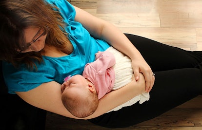 mother holding baby daughter