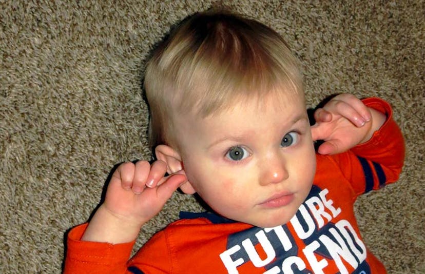toddler blocking ears