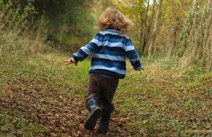 toddler running outdoors