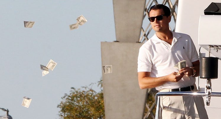 dicaprio throwing money