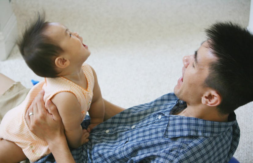 father and son playing