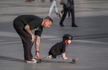 father and son skating