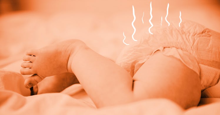 A baby lying on its back in a fully-loaded smelly diaper