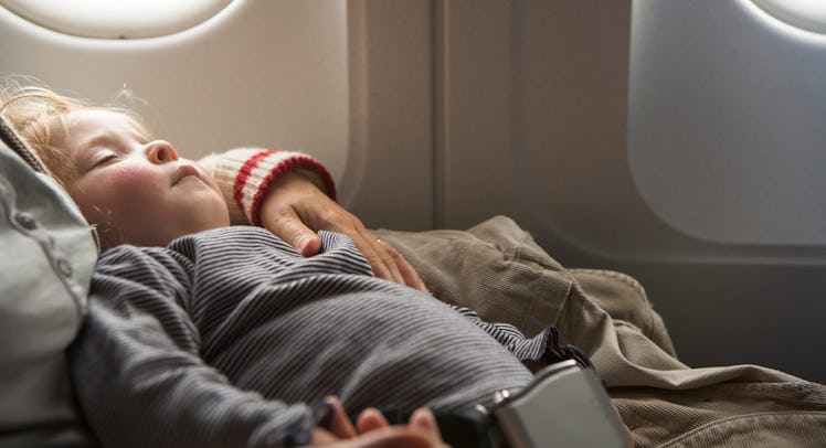 toddler sleeping on airplane