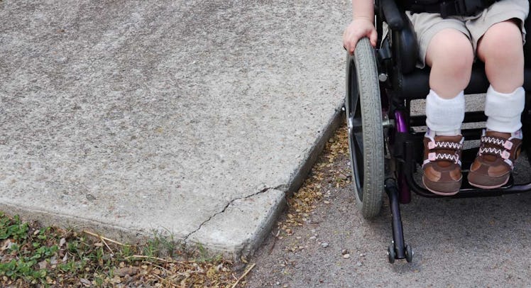 toddler on wheelchair