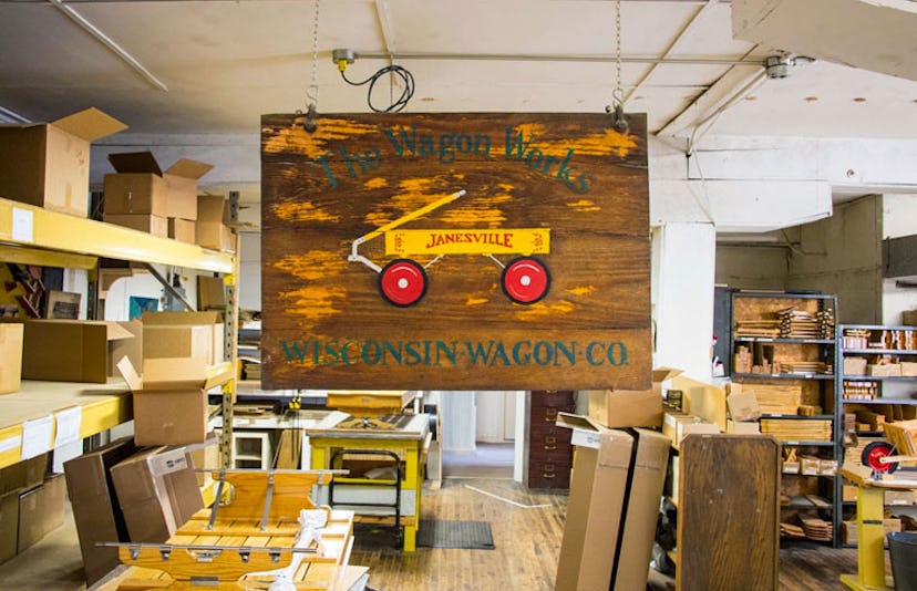 The Wisconsin Wagon Company sign handing in a workshop 