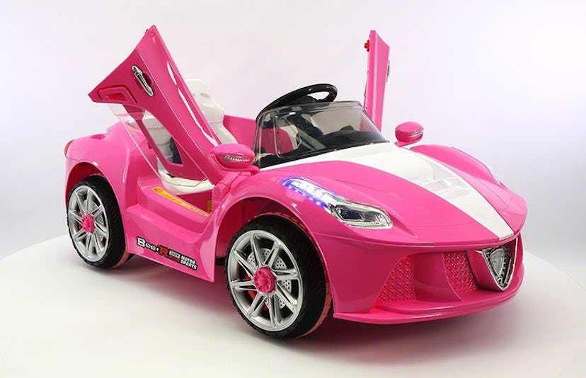 A pink and white Ferrari Spider as one of the best luxury ride-on cars for kids