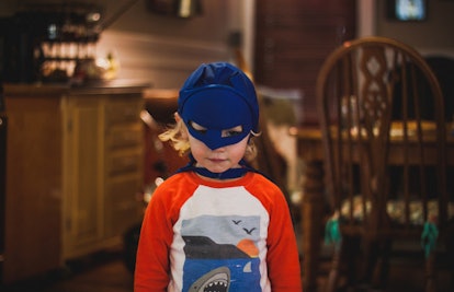 boy in superhero mask
