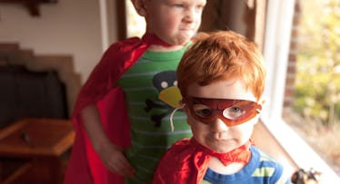 kids in superhero costumes