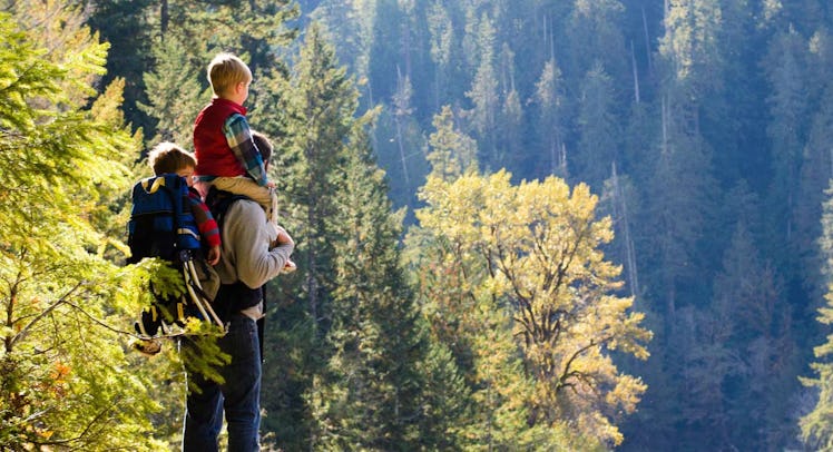 dad hiking with sons
