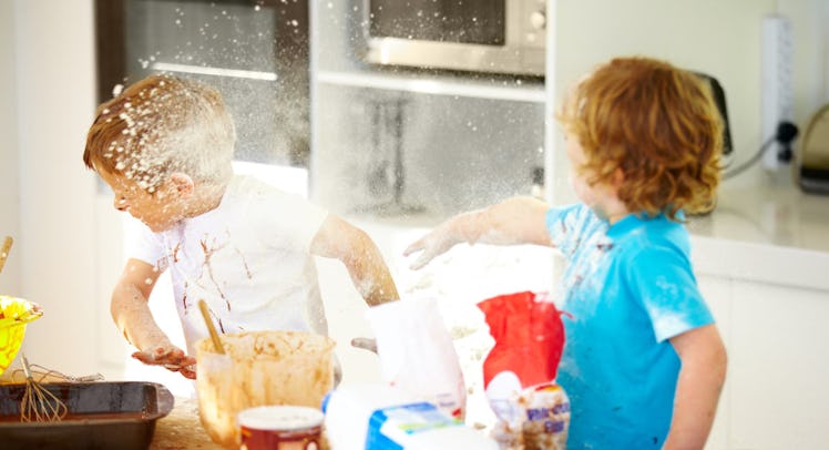 siblings fighting in kitchen