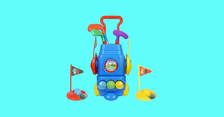 kids golf set is pictured against a light blue backdrop