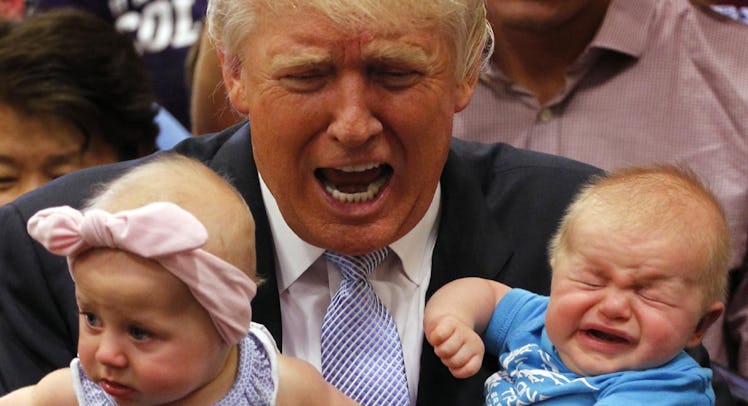 donald trump holds crying babies