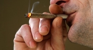 man smoking joint