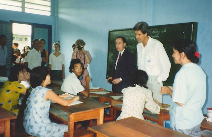 John Kerry at a school in Vietnam in 1990 